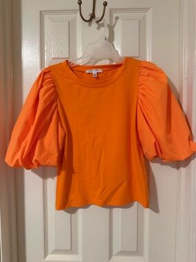 Orange women’s puff sleeve top